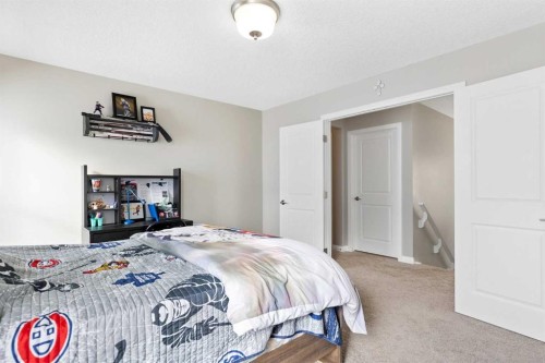 26 Marquis Heights Se, Calgary, AB - Indoor Photo Showing Bedroom