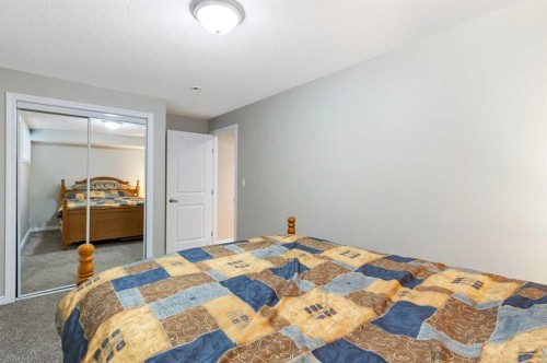 26 Marquis Heights Se, Calgary, AB - Indoor Photo Showing Bedroom