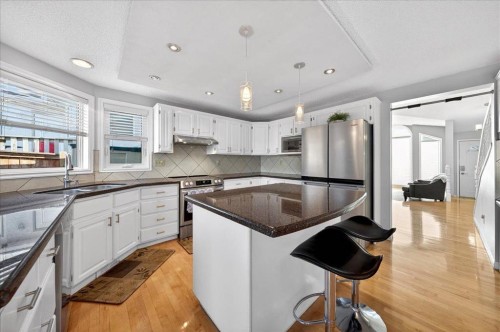 137 Woodbrook Road Sw, Calgary, AB - Indoor Photo Showing Kitchen With Stainless Steel Kitchen With Upgraded Kitchen