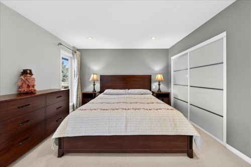 137 Woodbrook Road Sw, Calgary, AB - Indoor Photo Showing Bedroom