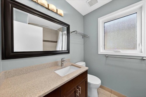 137 Woodbrook Road Sw, Calgary, AB - Indoor Photo Showing Bathroom