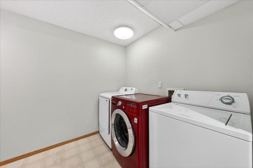137 Woodbrook Road Sw, Calgary, AB - Indoor Photo Showing Laundry Room