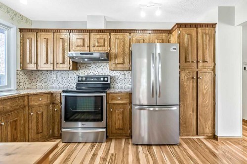 107 Lock Crescent, Okotoks, AB - Indoor Photo Showing Kitchen