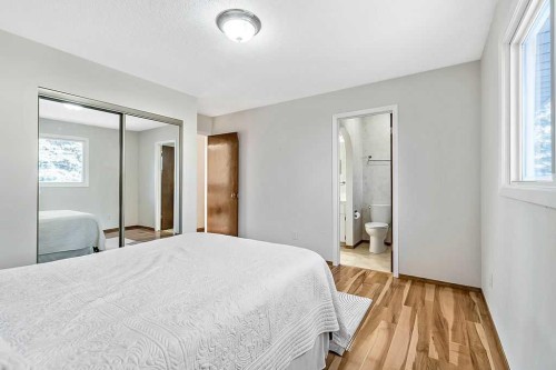 107 Lock Crescent, Okotoks, AB - Indoor Photo Showing Bedroom
