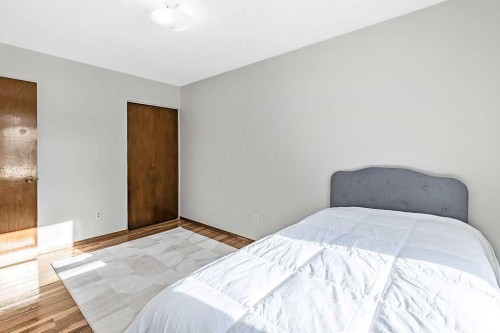 107 Lock Crescent, Okotoks, AB - Indoor Photo Showing Bedroom