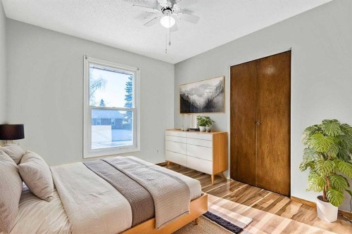 107 Lock Crescent, Okotoks, AB - Indoor Photo Showing Bedroom