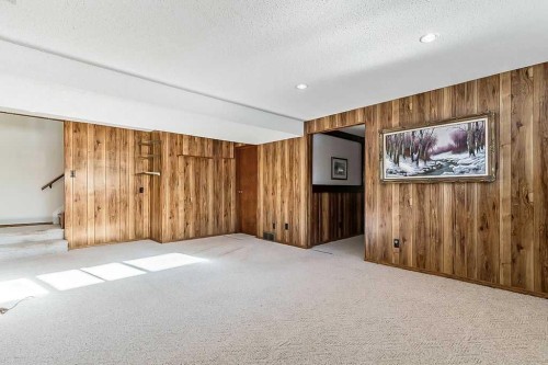 107 Lock Crescent, Okotoks, AB - Indoor Photo Showing Other Room