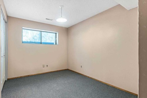 107 Lock Crescent, Okotoks, AB - Indoor Photo Showing Other Room
