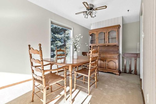 107 Lock Crescent, Okotoks, AB - Indoor Photo Showing Dining Room