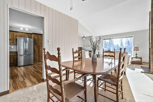 107 Lock Crescent, Okotoks, AB - Indoor Photo Showing Dining Room