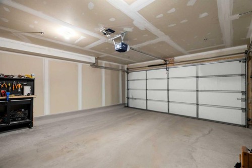 201-85 Dyrgas Gate, Canmore, AB - Indoor Photo Showing Garage