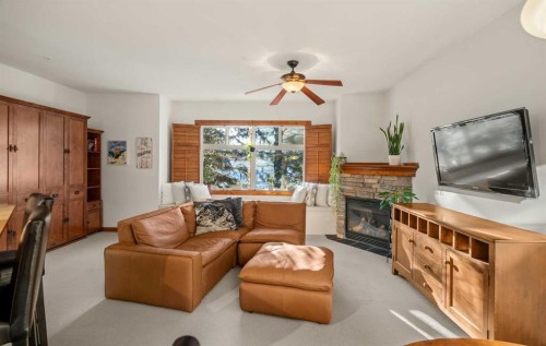 201-85 Dyrgas Gate, Canmore, AB - Indoor Photo Showing Living Room With Fireplace