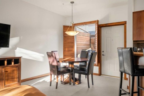 201-85 Dyrgas Gate, Canmore, AB - Indoor Photo Showing Dining Room