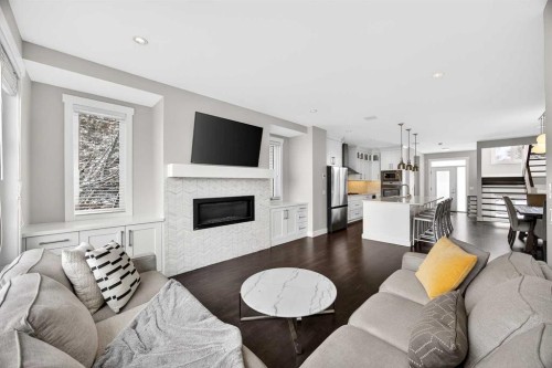 1410 21 Avenue Nw, Calgary, AB - Indoor Photo Showing Living Room With Fireplace