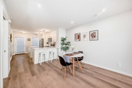 307-474 Seton Circle Se, Calgary, AB - Indoor Photo Showing Dining Room