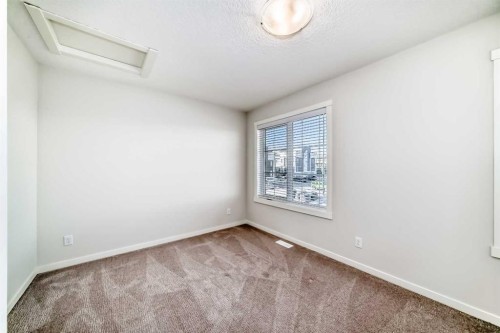 307-474 Seton Circle Se, Calgary, AB - Indoor Photo Showing Other Room