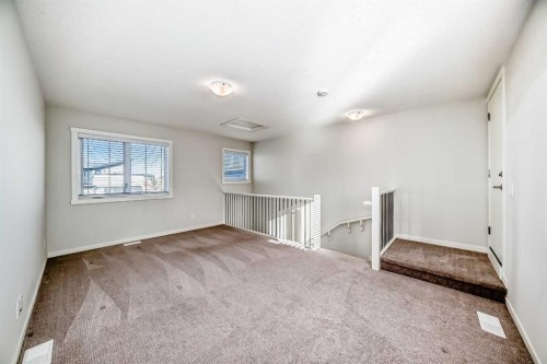 307-474 Seton Circle Se, Calgary, AB - Indoor Photo Showing Other Room