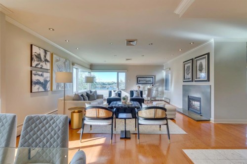 3N-222 Eagle Ridge Drive Sw, Calgary, AB - Indoor Photo Showing Living Room With Fireplace