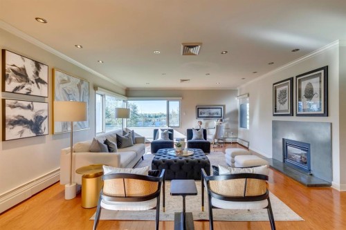 3N-222 Eagle Ridge Drive Sw, Calgary, AB - Indoor Photo Showing Living Room With Fireplace