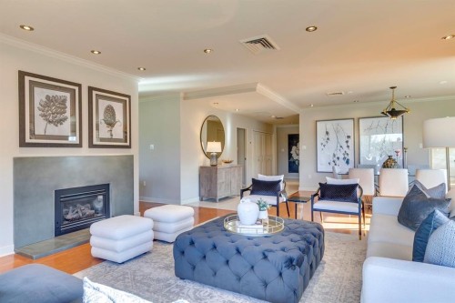 3N-222 Eagle Ridge Drive Sw, Calgary, AB - Indoor Photo Showing Living Room With Fireplace