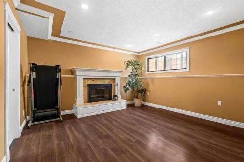 1343 Berkley Drive Nw, Calgary, AB - Indoor With Fireplace