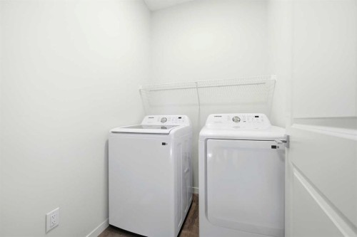 185 Edith Green Nw, Calgary, AB - Indoor Photo Showing Laundry Room