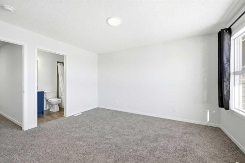 185 Edith Green Nw, Calgary, AB - Indoor Photo Showing Other Room