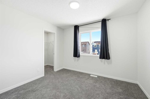 185 Edith Green Nw, Calgary, AB - Indoor Photo Showing Other Room