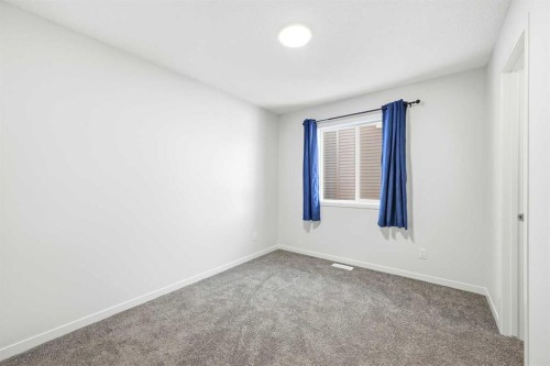185 Edith Green Nw, Calgary, AB - Indoor Photo Showing Other Room