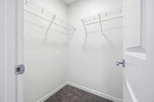 185 Edith Green Nw, Calgary, AB - Indoor With Storage