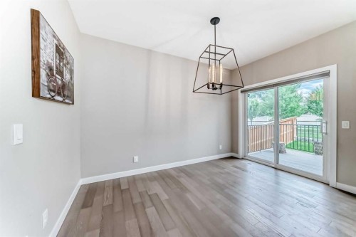41 Shawnee Green Sw, Calgary, AB - Indoor Photo Showing Other Room