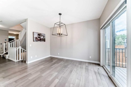 41 Shawnee Green Sw, Calgary, AB - Indoor Photo Showing Other Room