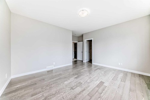 41 Shawnee Green Sw, Calgary, AB - Indoor Photo Showing Other Room