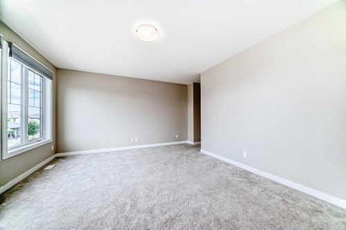 41 Shawnee Green Sw, Calgary, AB - Indoor Photo Showing Other Room