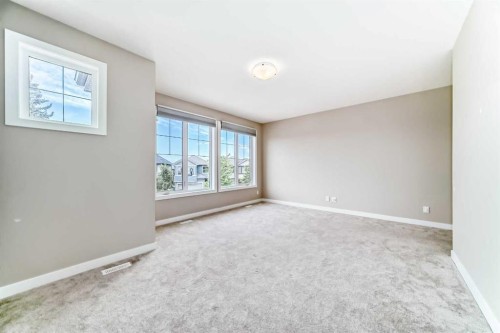 41 Shawnee Green Sw, Calgary, AB - Indoor Photo Showing Other Room