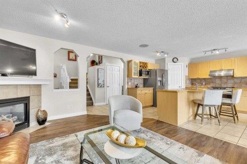 103 Panamount Crescent Nw, Calgary, AB - Indoor With Fireplace