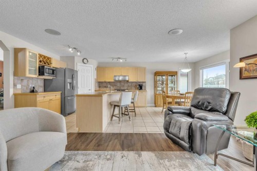 103 Panamount Crescent Nw, Calgary, AB - Indoor Photo Showing Living Room