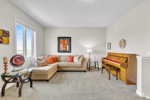 103 Panamount Crescent Nw, Calgary, AB - Indoor Photo Showing Living Room
