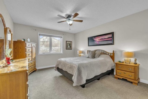 103 Panamount Crescent Nw, Calgary, AB - Indoor Photo Showing Bedroom