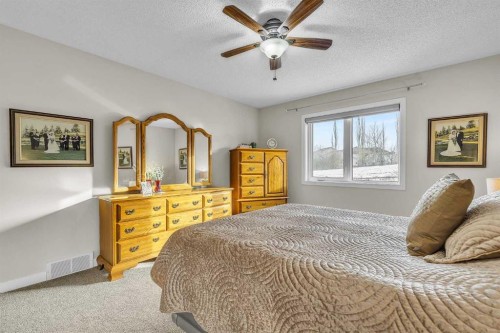 103 Panamount Crescent Nw, Calgary, AB - Indoor Photo Showing Bedroom