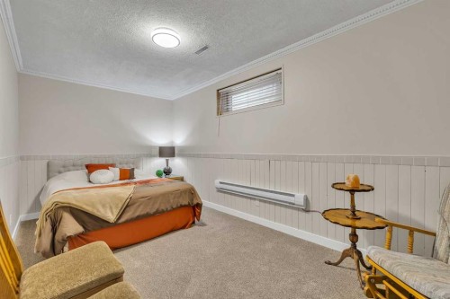103 Panamount Crescent Nw, Calgary, AB - Indoor Photo Showing Bedroom