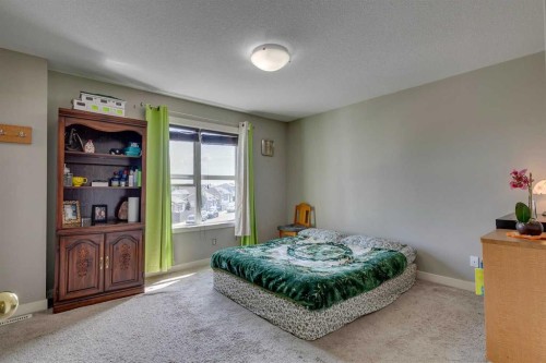 43 Sunrise Crescent Ne, High River, AB - Indoor Photo Showing Bedroom