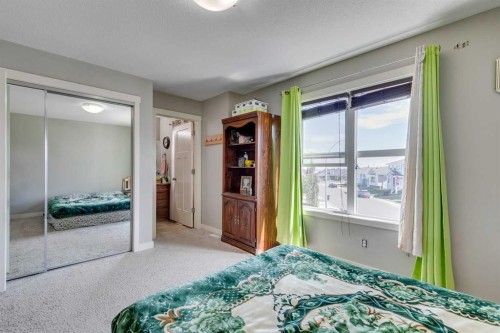 43 Sunrise Crescent Ne, High River, AB - Indoor Photo Showing Bedroom