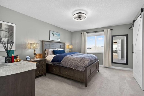 188 Sunrise Common, Cochrane, AB - Indoor Photo Showing Bedroom