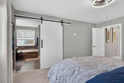 188 Sunrise Common, Cochrane, AB - Indoor Photo Showing Bedroom