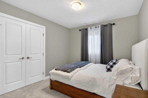 188 Sunrise Common, Cochrane, AB - Indoor Photo Showing Bedroom