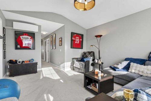 188 Sunrise Common, Cochrane, AB - Indoor Photo Showing Living Room