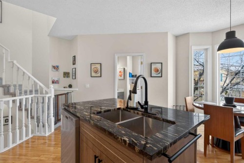 42 Hamptons Link Nw, Calgary, AB - Indoor Photo Showing Kitchen With Double Sink