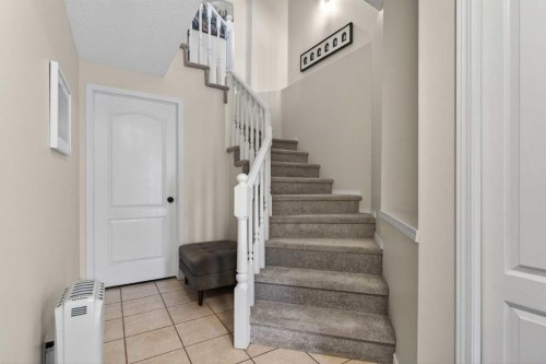 42 Hamptons Link Nw, Calgary, AB - Indoor Photo Showing Other Room
