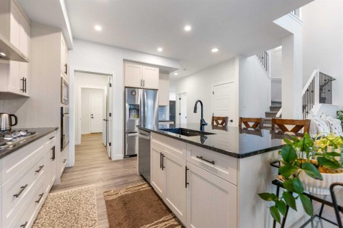 208 Dawson Circle, Chestermere, AB - Indoor Photo Showing Kitchen With Stainless Steel Kitchen With Upgraded Kitchen